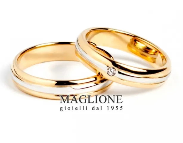 Trasformazione Fedi Nuziali 25 anni con filo centrale in oro bianco e 1 diamante