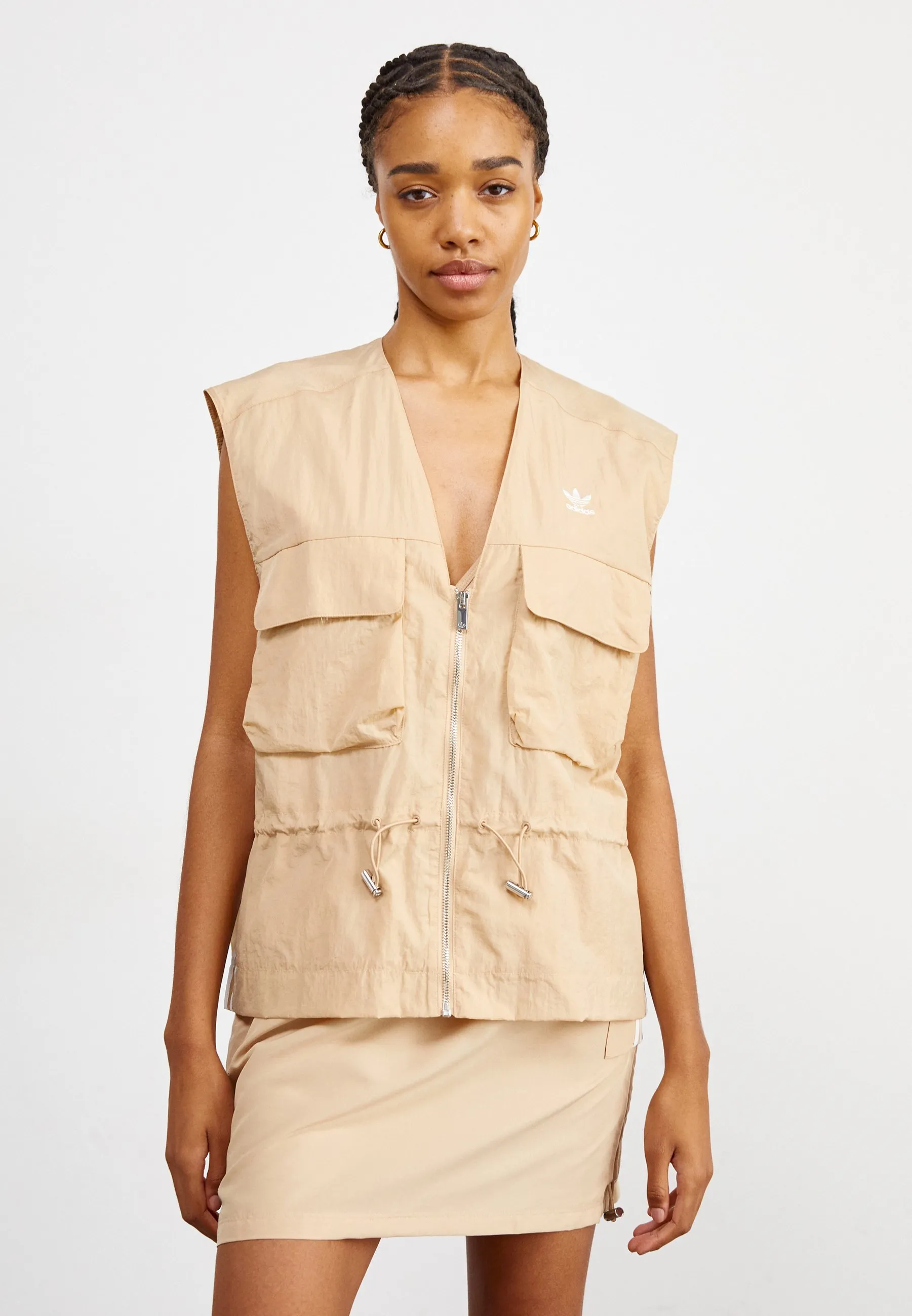 VEST - Smanicato