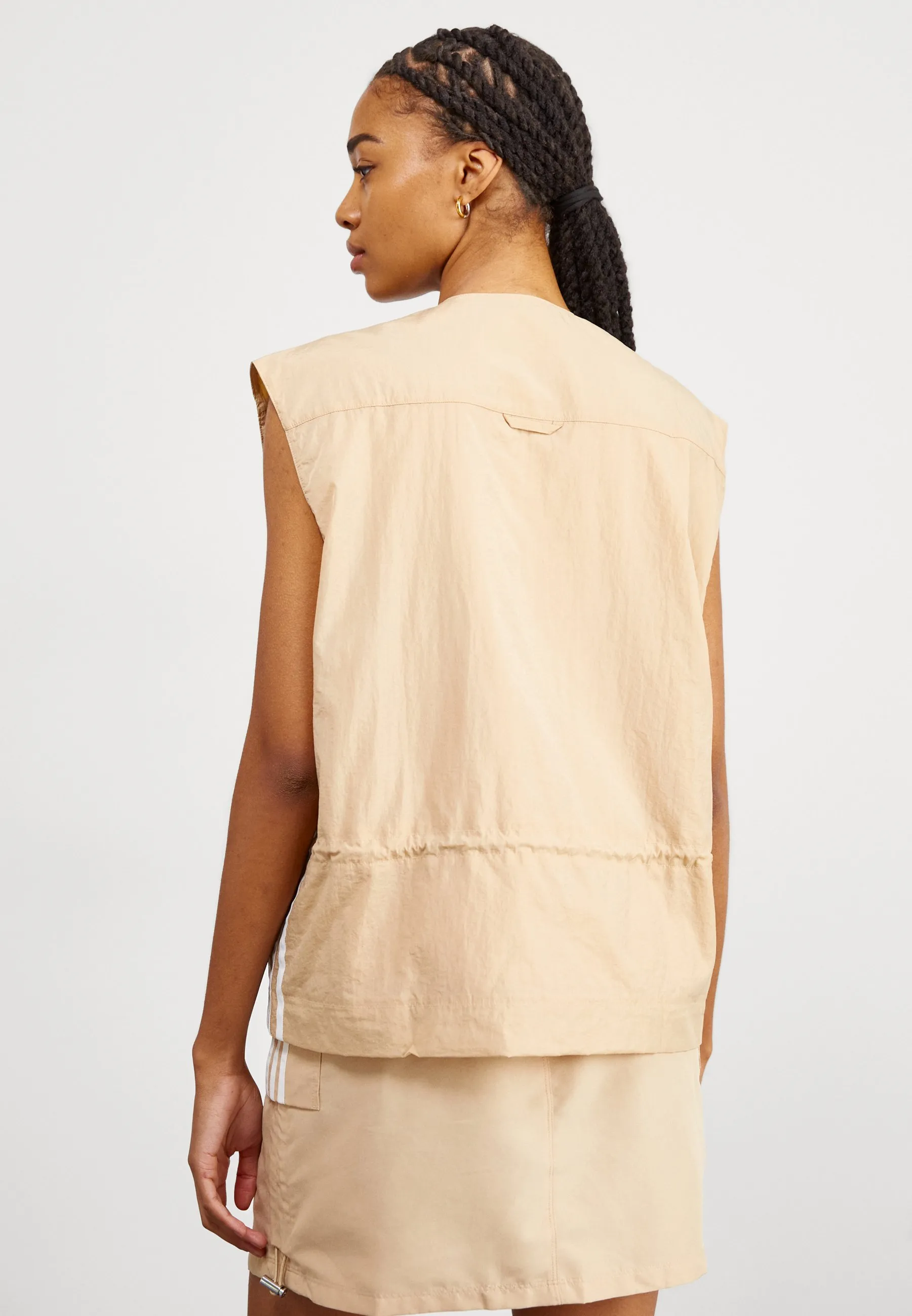 VEST - Smanicato