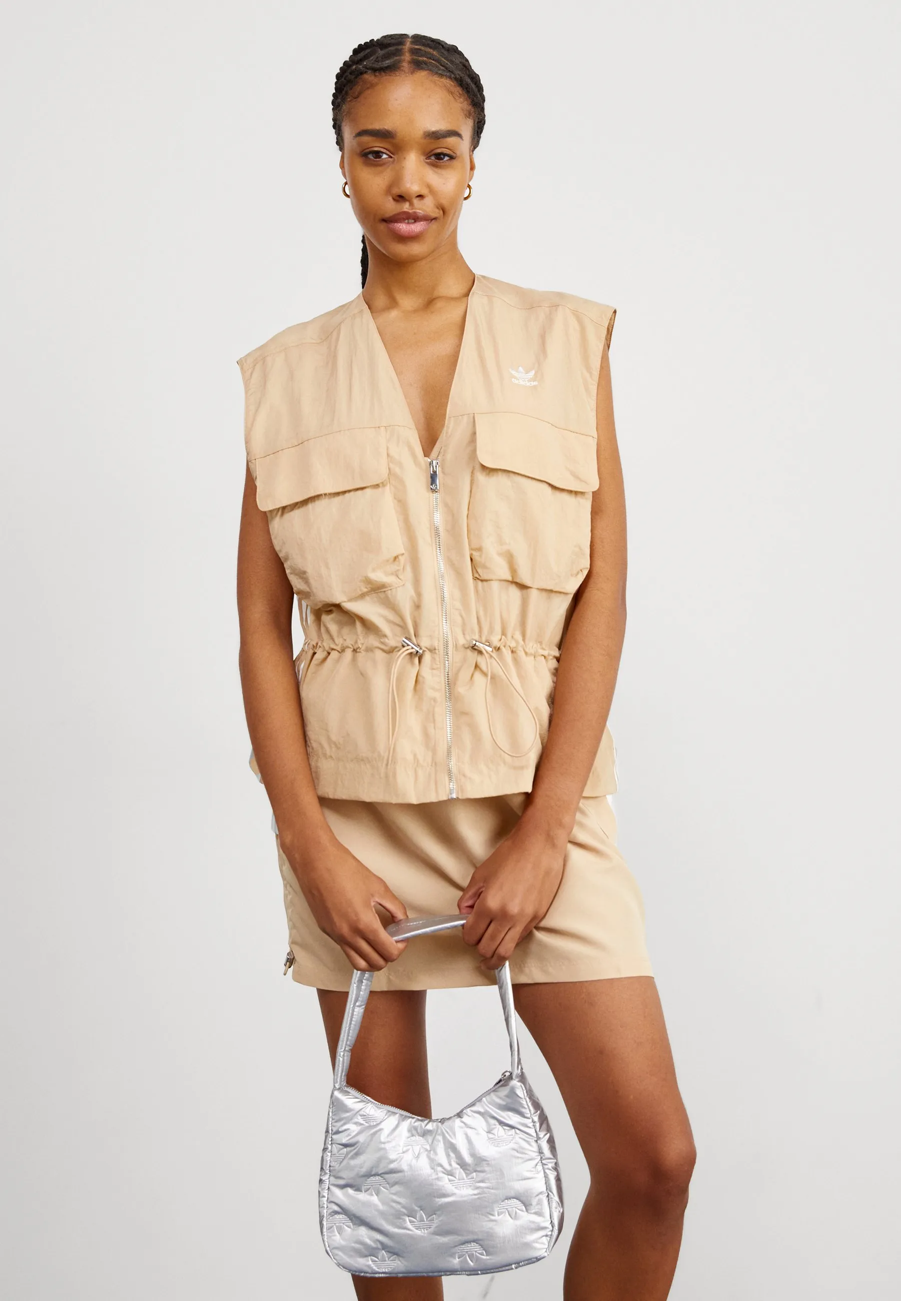 VEST - Smanicato