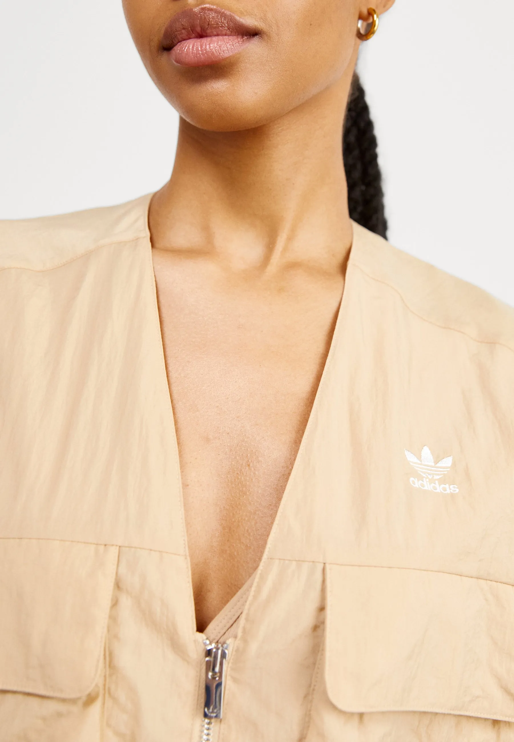 VEST - Smanicato
